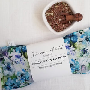 mint eye pillow with bowl of flax seeds