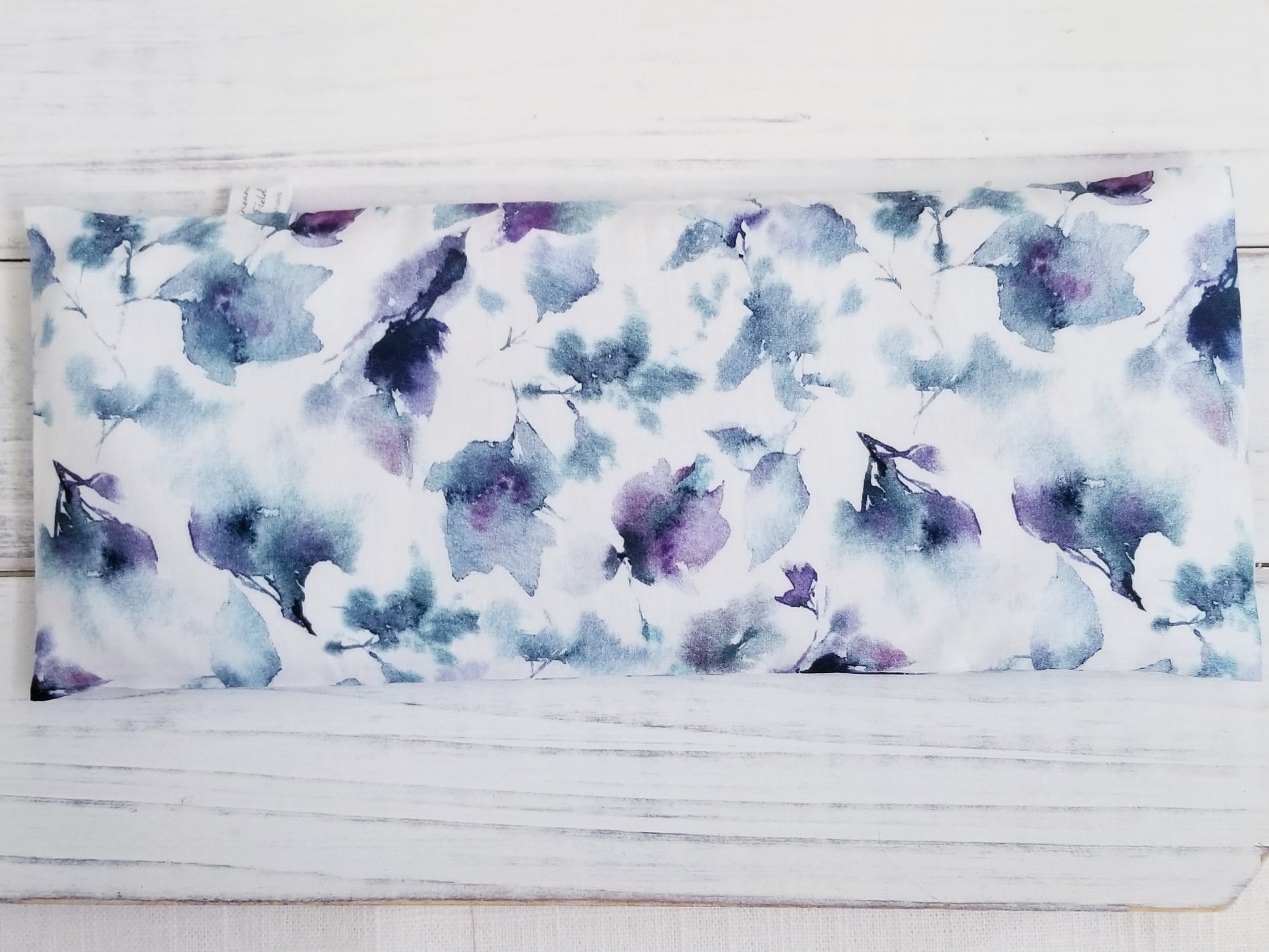 Closeup of blue watercolor sketch cotton fabric eye pillow cover