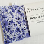 Close up of violet floral cotton print eye pillow by Dream Field Studio