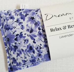 Close up of violet floral cotton print eye pillow by Dream Field Studio