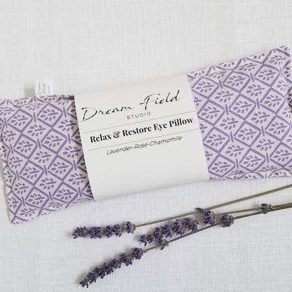 lavender rose eye pillow with tiny lavender floral design and 3 dried lavender stems