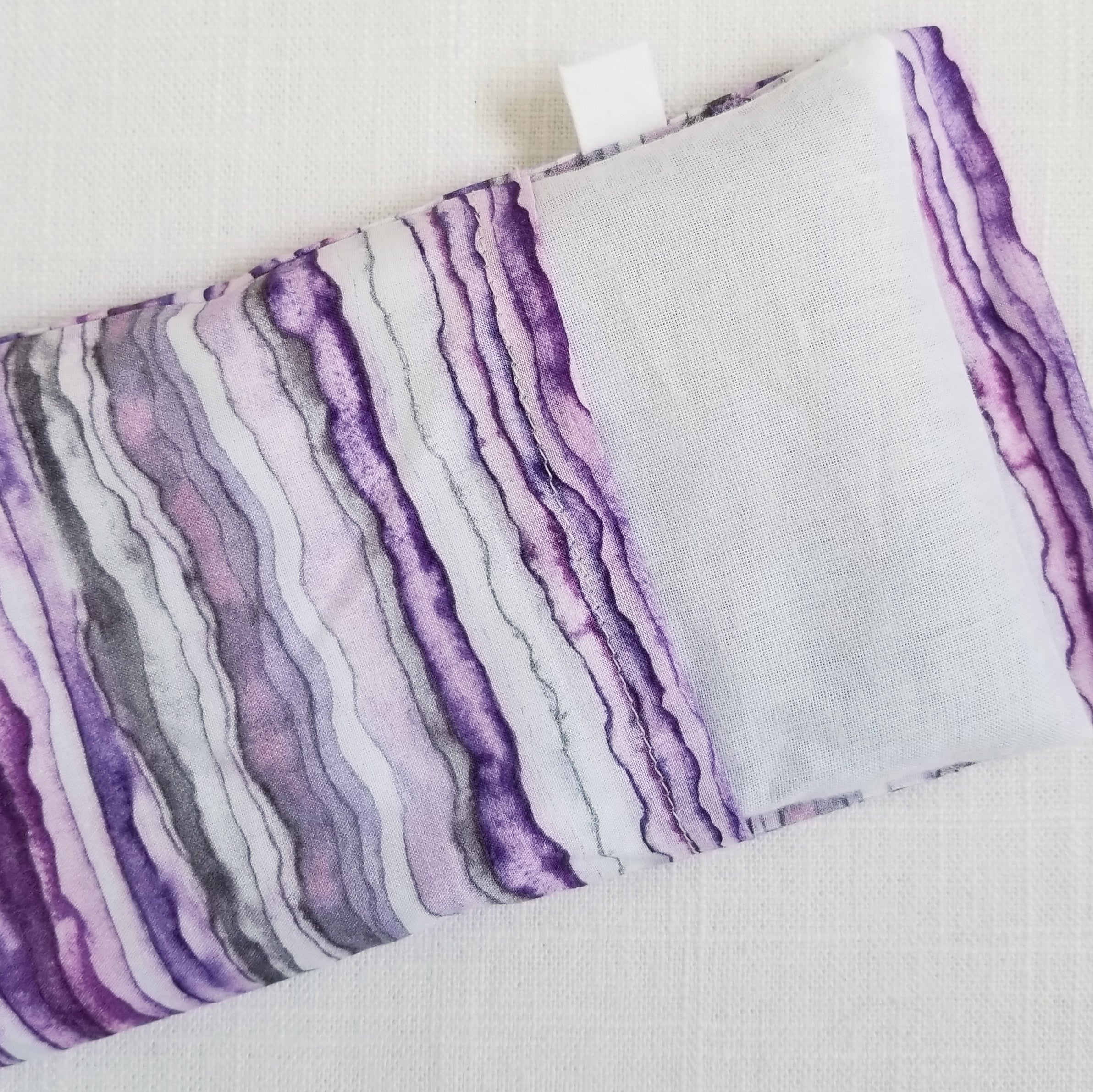 back of organic lavender eye pillow showing muslin insert