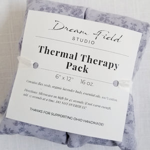 thermal therapy pack with lavender and Dream Field Studio white label on front