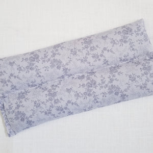 thermal therapy pack in vintage lavender floral laid flat 