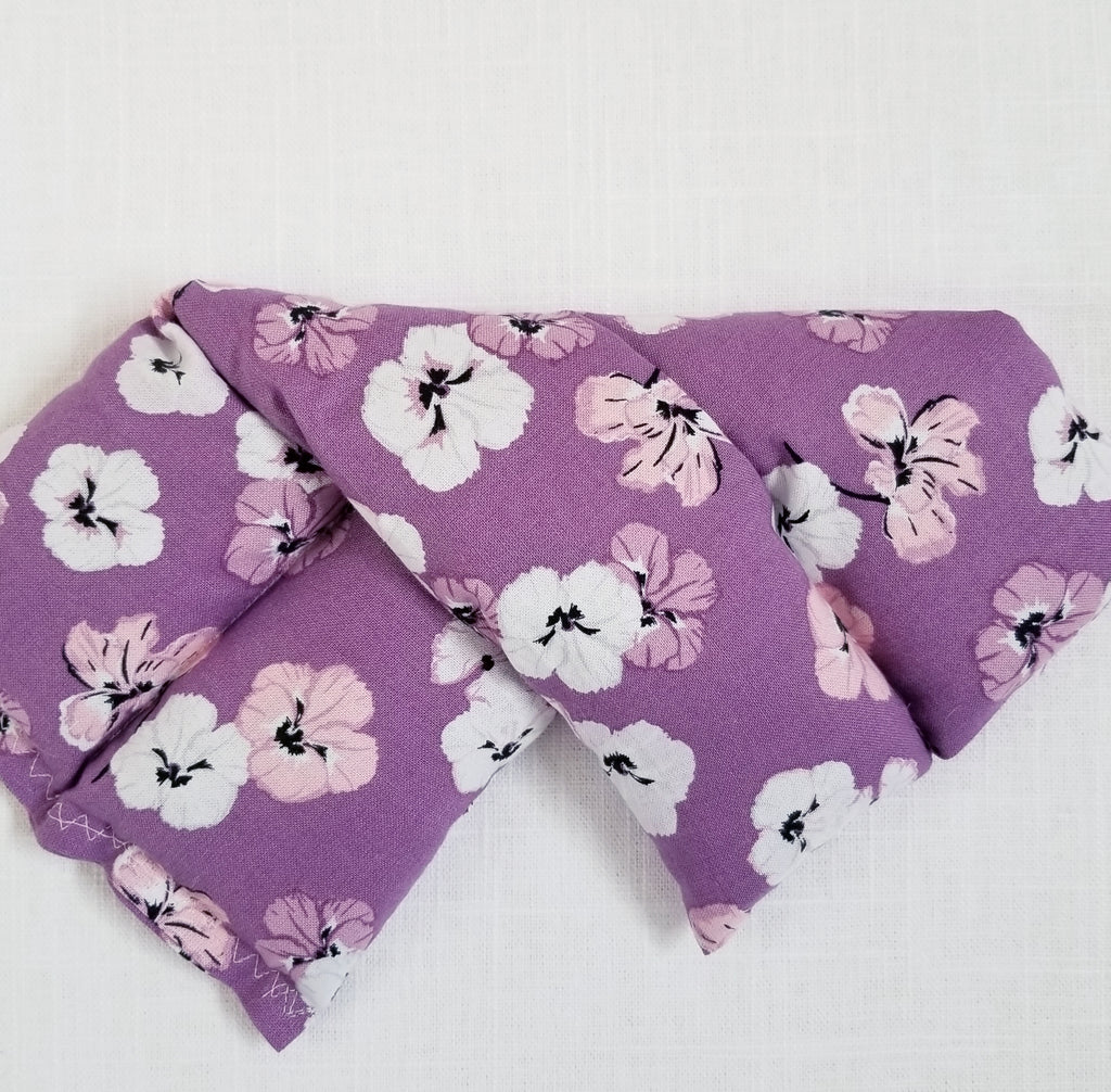 mini heat wrap Thermal Therapy Pack in purple pansy print cotton bag