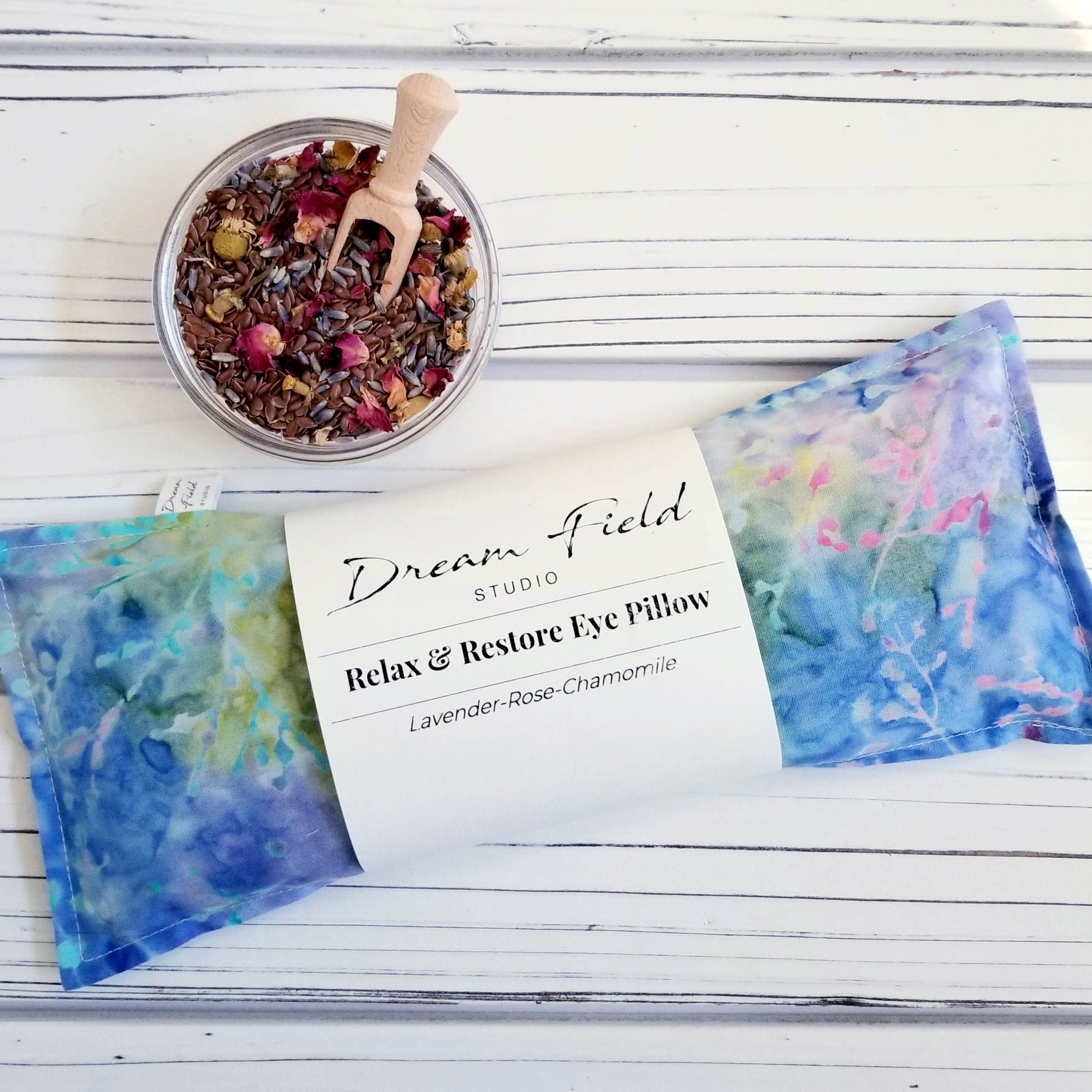 Undersea Blue Batik Eye Pillow with bowl of flax seed and organic herbs