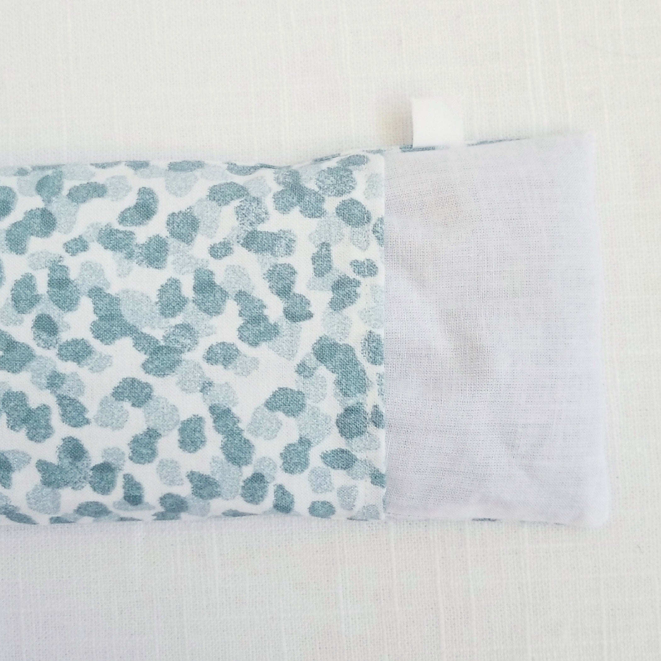 Close up of backside of eye pillow showing muslin insert
