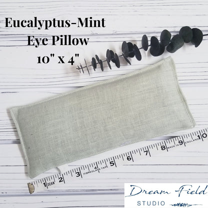 Size specifications for 10" x 4" eucalyptus-mint eye pillow and sprig of eucalyptus by Dream Field Studio