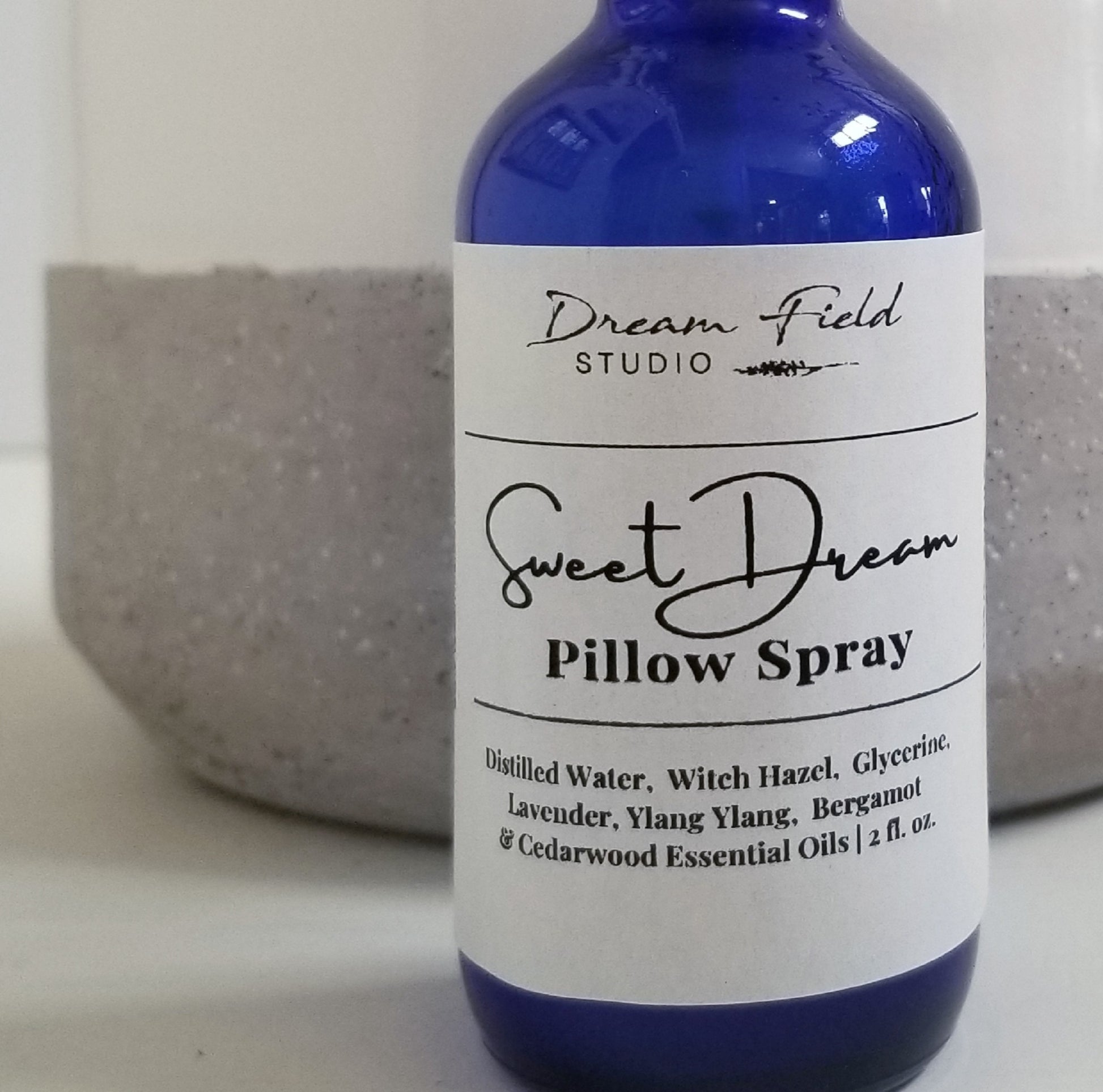 Sweet Dream Pillow Mist in cobalt blue glass bottle