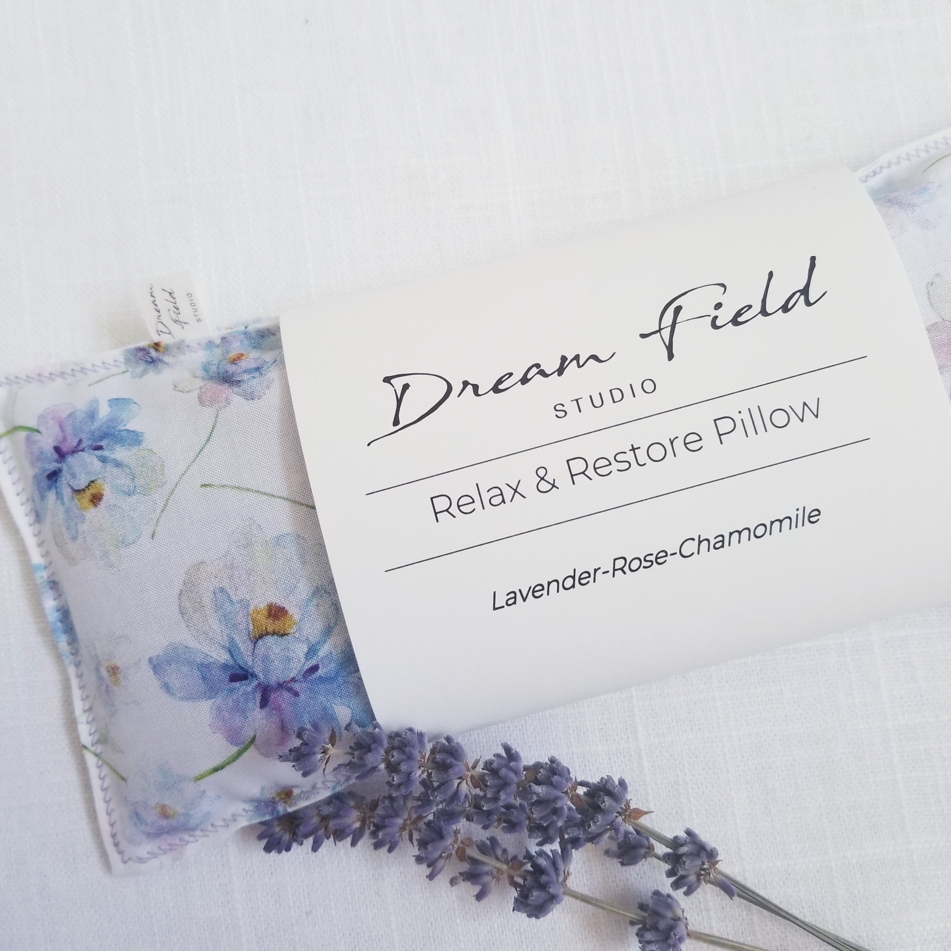 lavender eye pillow with blue peonies and 2 lavender stems