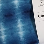 closeup of blue comfort & care pillow blue shibori print